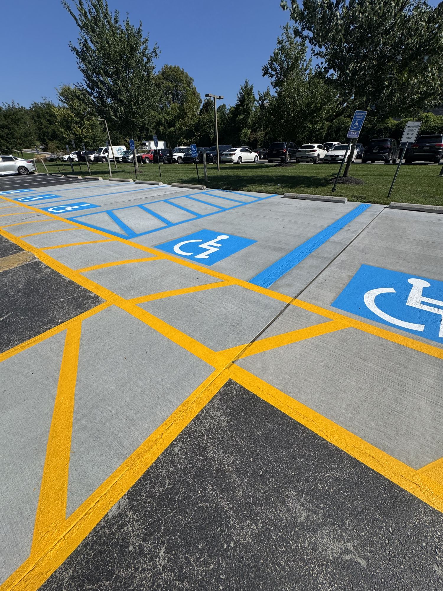New concrete accessible parking and striped crosswalk in Penn Wynne, Pennsylvania