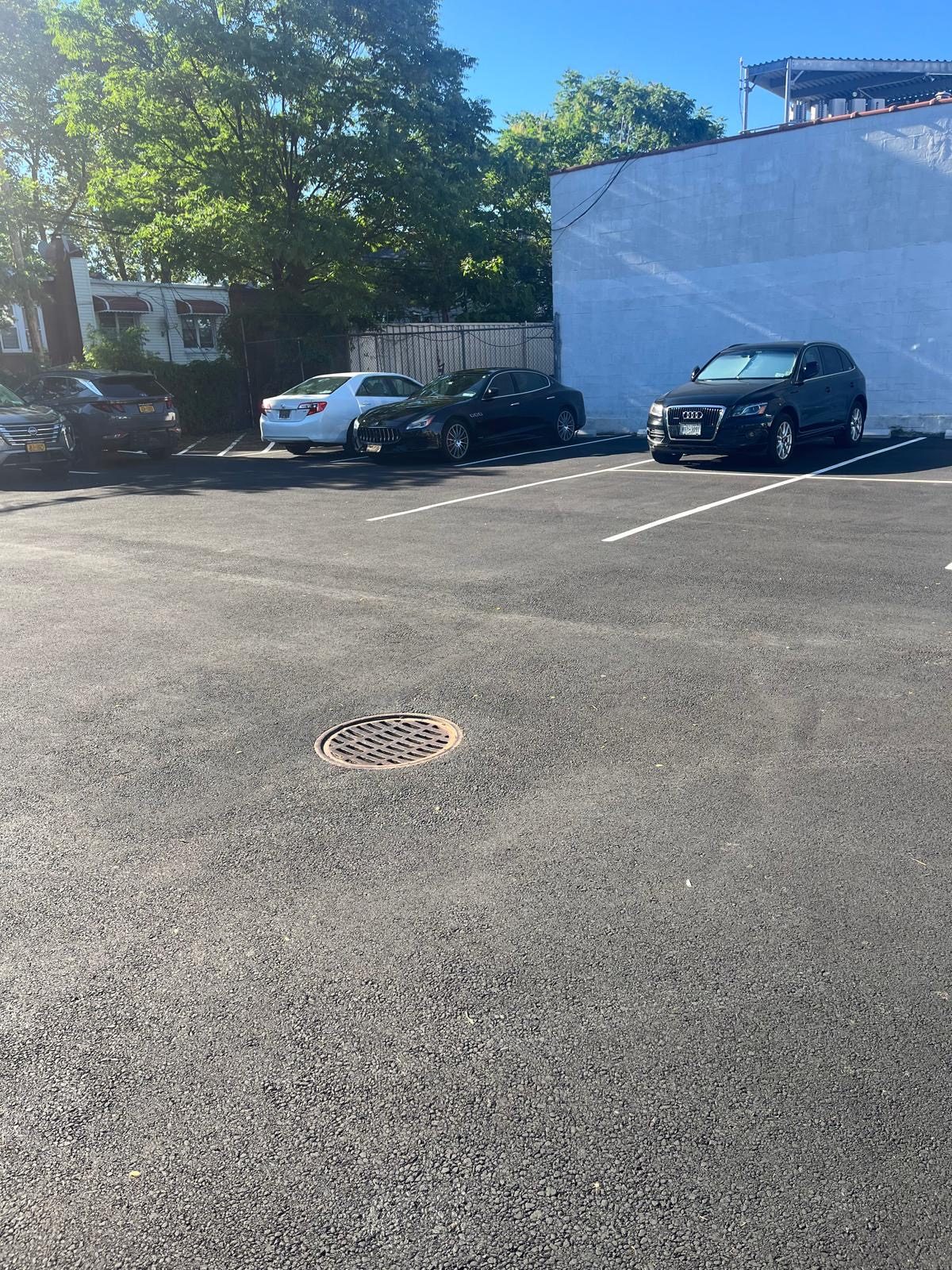 Freshly paved and striped commercial parking lot in Brooklyn, New York